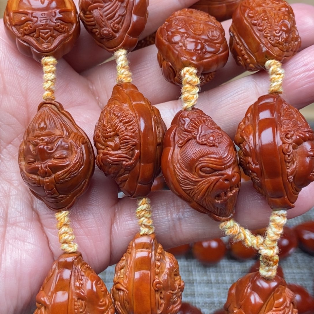 桃***面橄榄核吊坠万佛朝宗