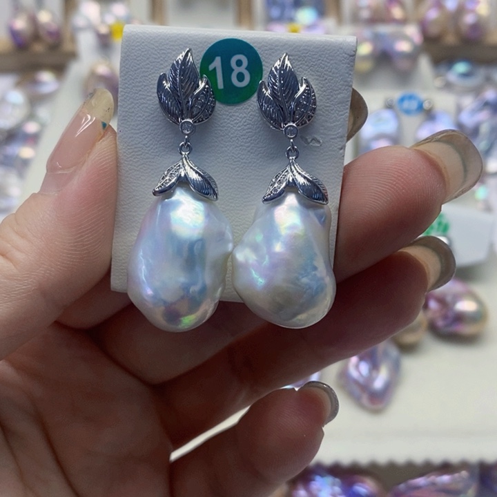 银S925镶嵌耳饰淡水珍珠许***馆