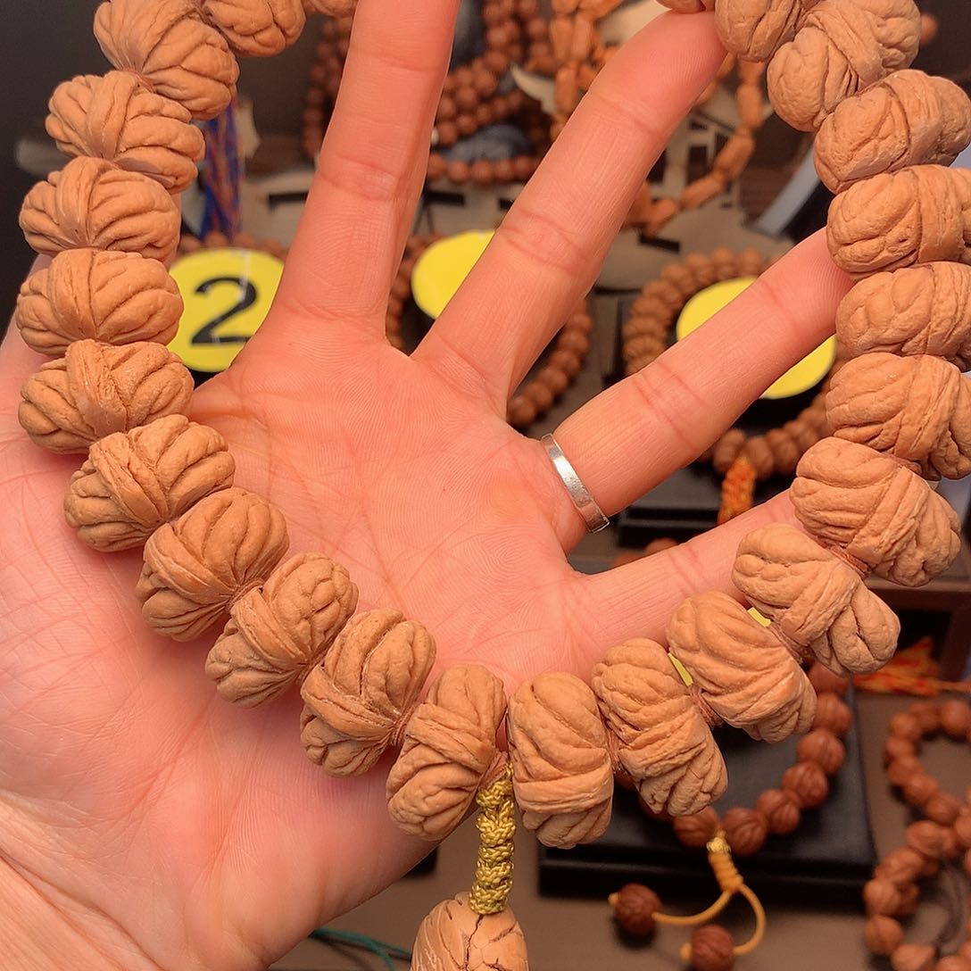 桃核吊坠一****）霸王龙手持25