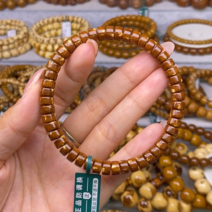 阿***b紫金鼠手串药片74