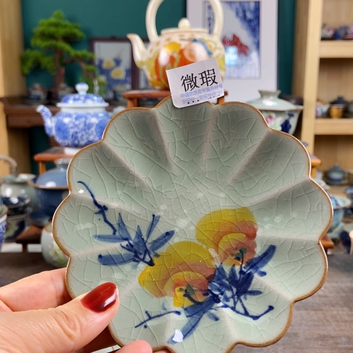 瓷片手工制作工艺精湛等特点为