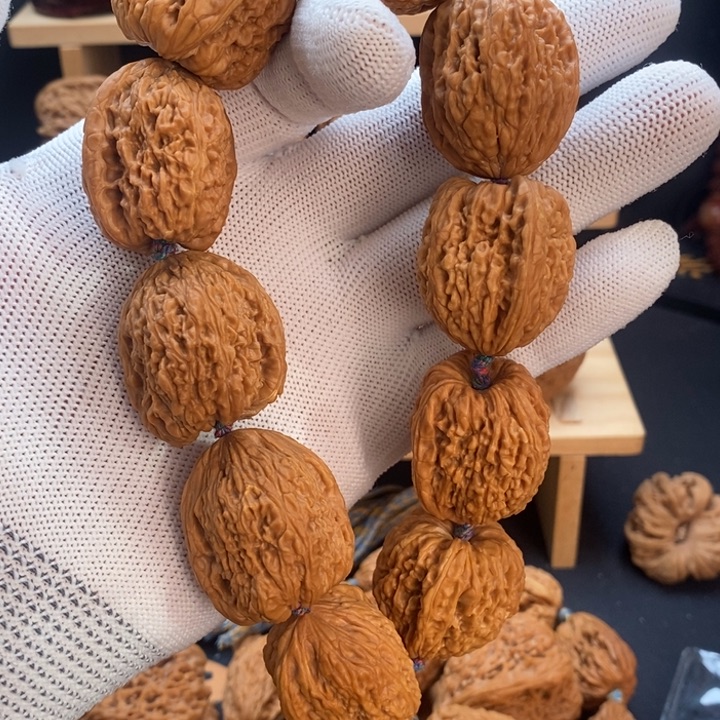 6***.文玩核桃吊坠南将石