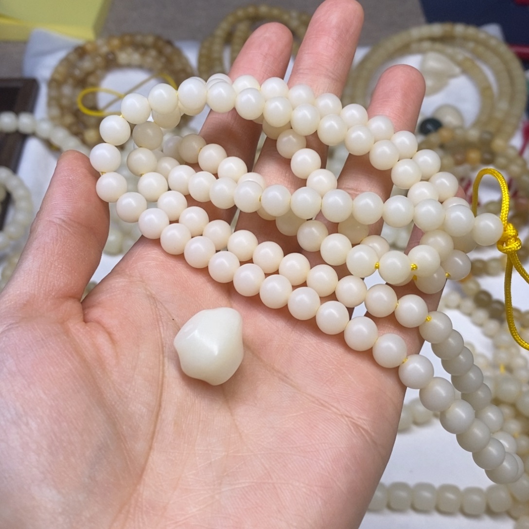 孙***哼吊坠菩提根/象牙果孙