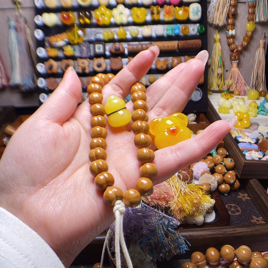 手串猴头核桃T****姐葫芦 小熊 黄色流苏