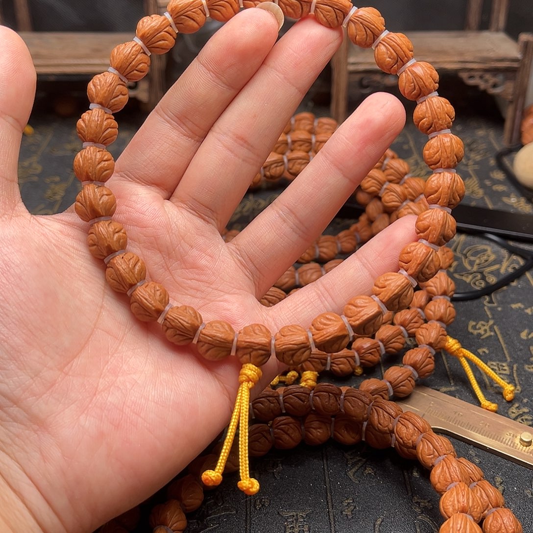 桃核吊坠玉龙手持