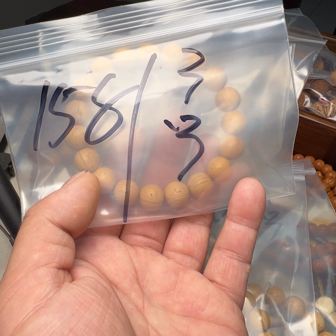 李***条三醋酯纤维盘锦桃核
