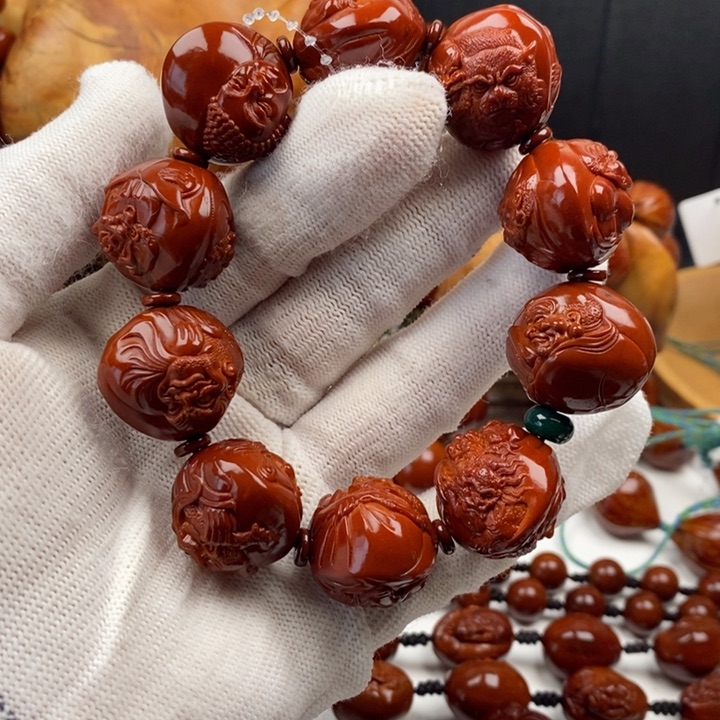 橄榄核手串李*生我想知道