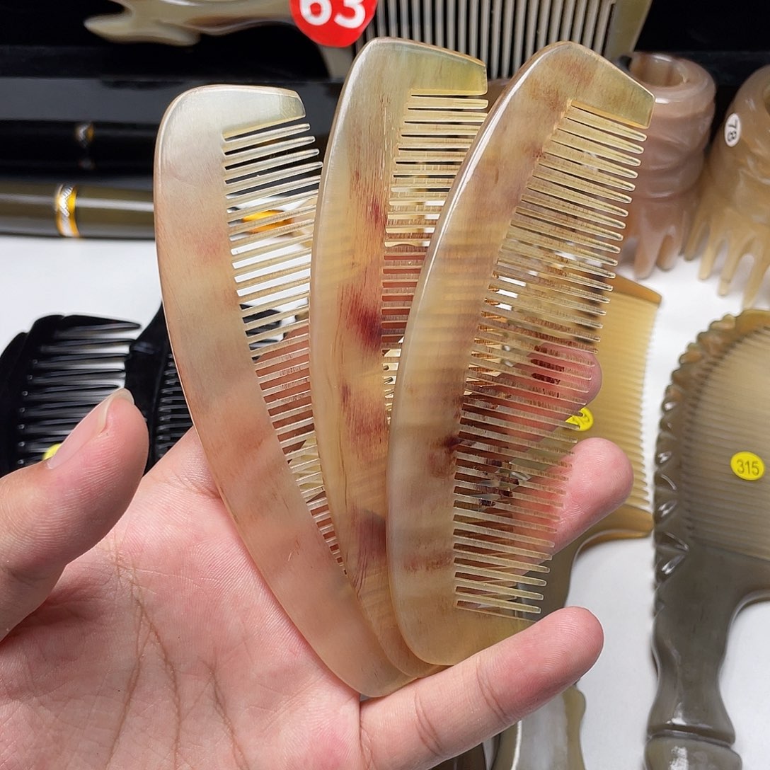 一物一拍牛角梳黄半圆