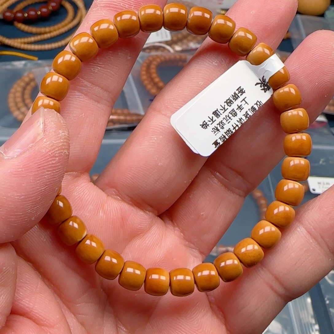 橄榄核手串老挝SSS级核尖极限弧尺寸6.9微变色