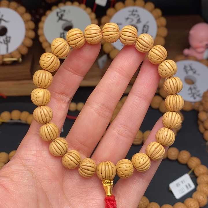 桃核手串黄桃10.5………..