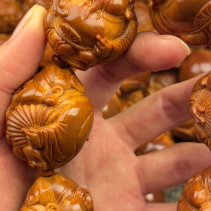 橄榄核吊坠依**往橄榄