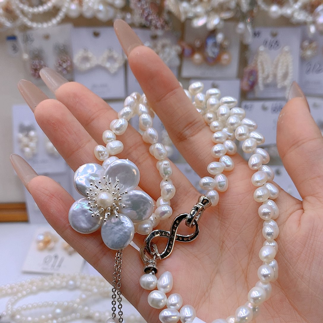 银S925镶嵌淡水珍珠耳饰幸*草