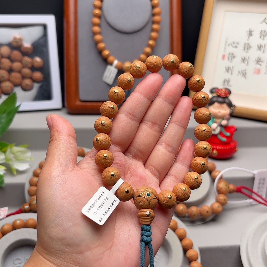 邦***拳手串凤眼菩提12.5左右镶嵌手串