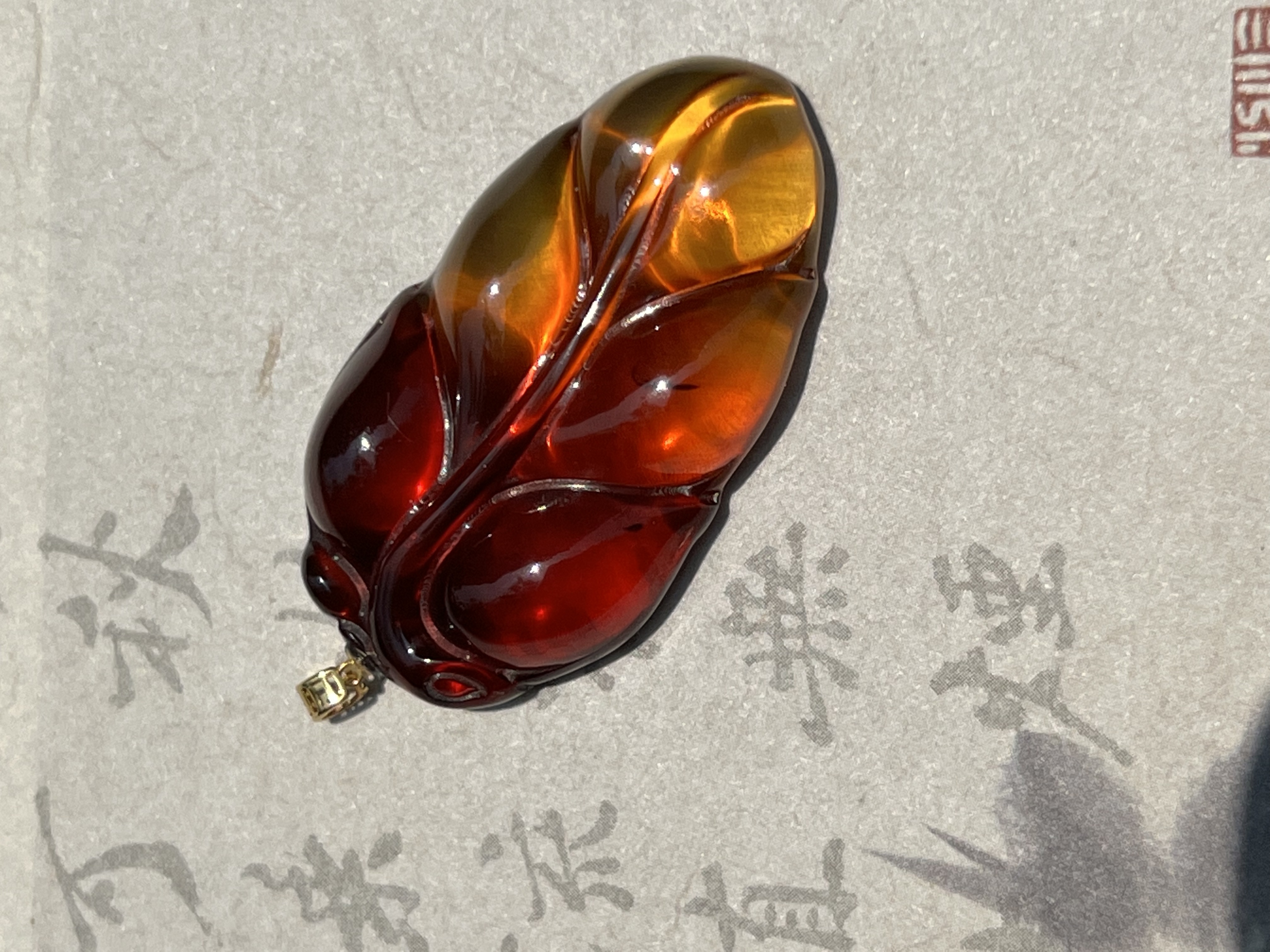 金红血珀18K金镶嵌吊坠