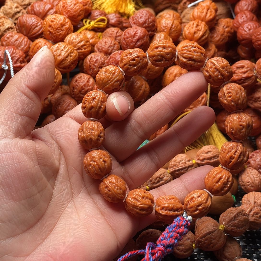 愤***鸟文玩核桃手串八棱