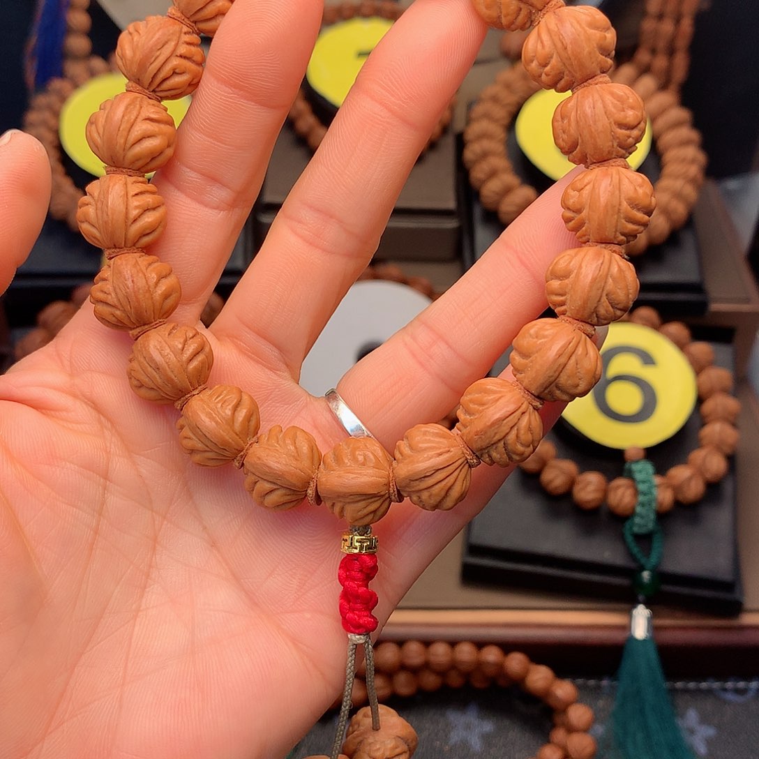 桃核手串野生红莲15