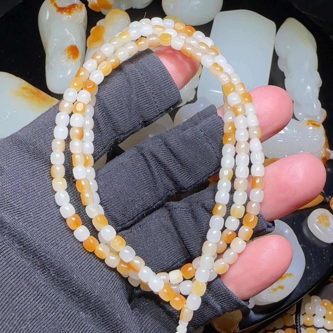 柠***肉和田玉未镶嵌颈饰