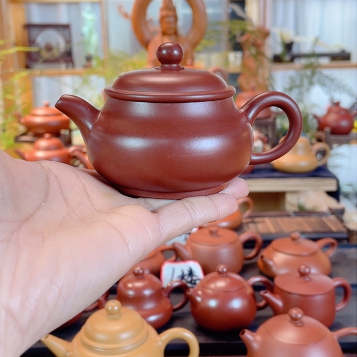 紫砂茶壶_**、潮州手工手拉壶