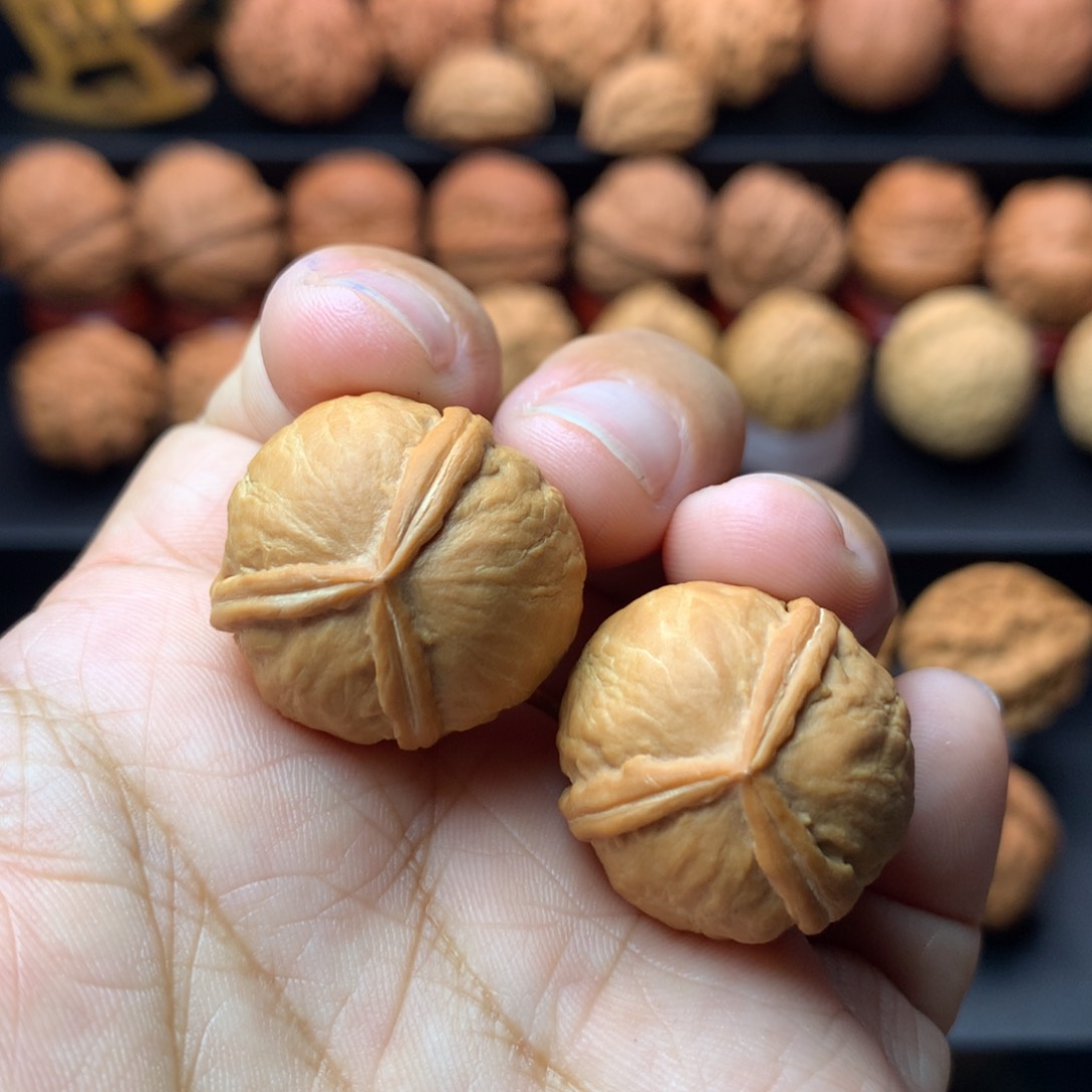 文玩核桃把件金豆子三棱