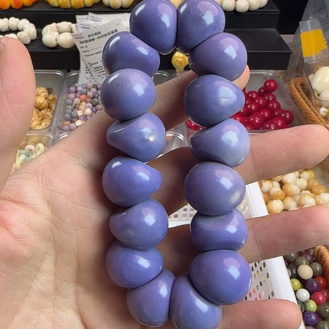 菩提根/象牙果手串微瑕疵紫色蒜瓣大肠手串一条