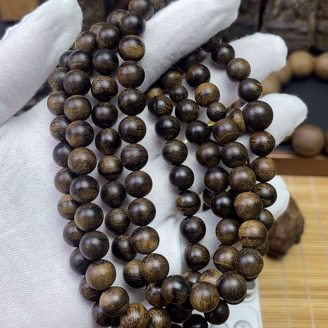 回***眸沉香手串越南白奇………………