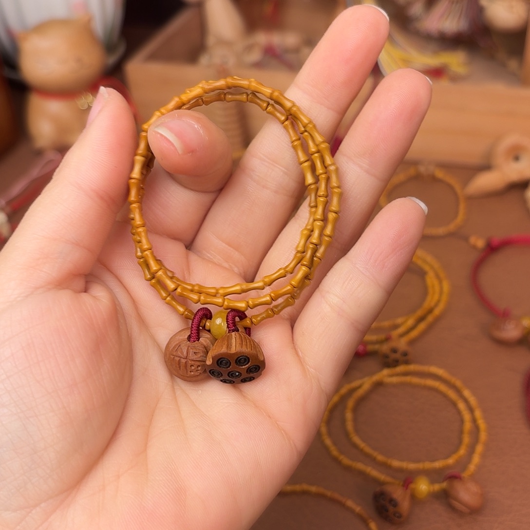 桃核吊坠竹节手链，好运连连，三圈