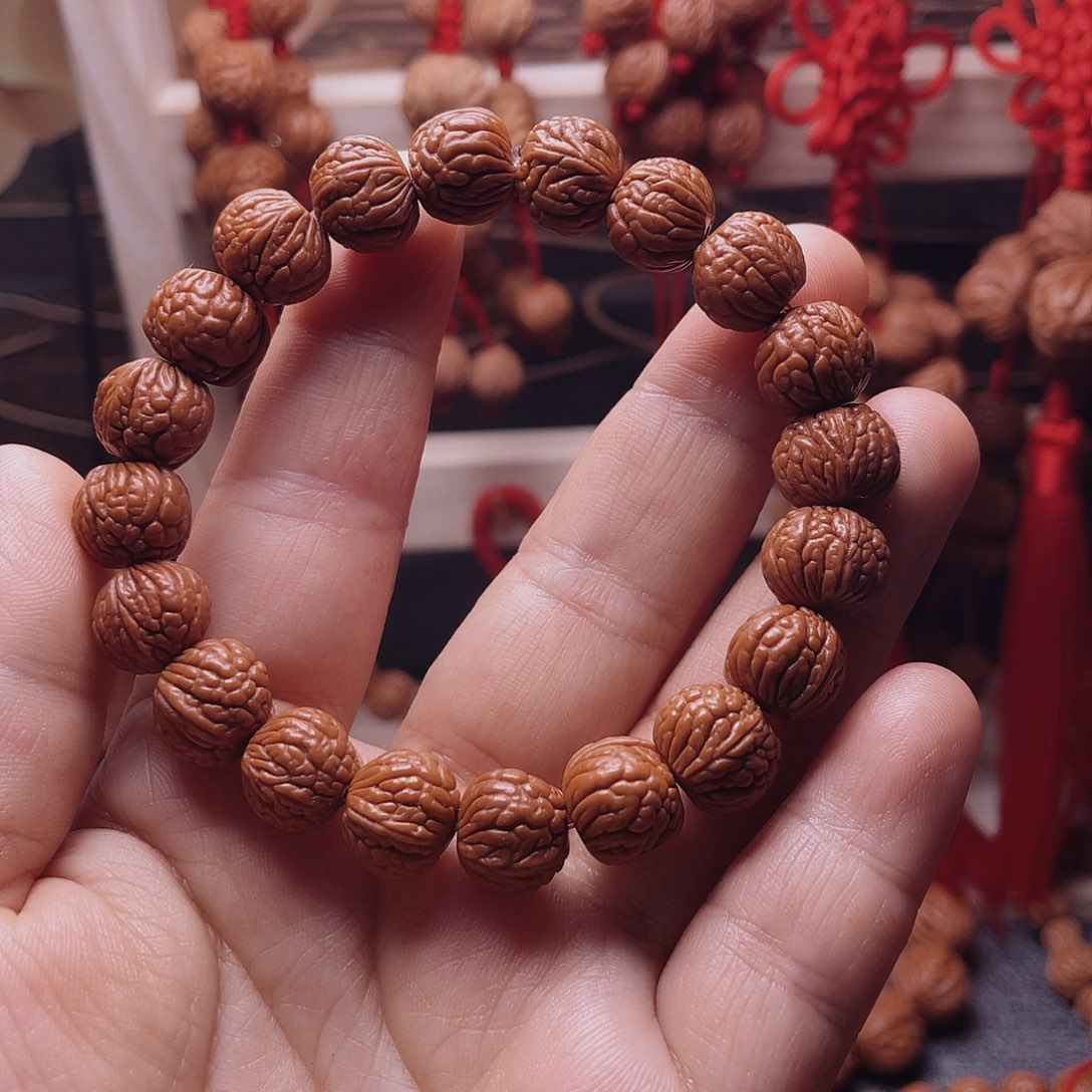 木质类龙纹桃枭手串