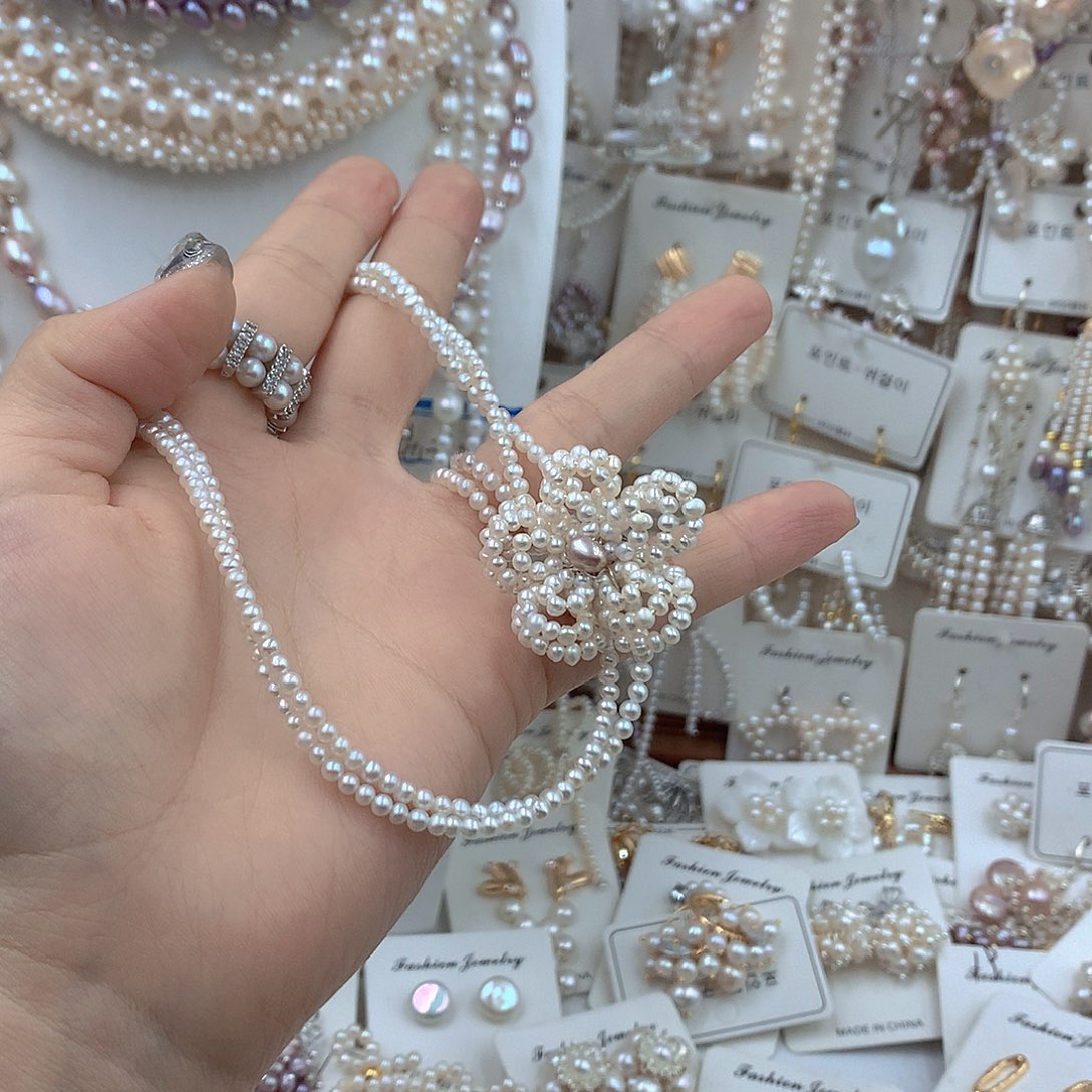 星****银S925镶嵌淡水珍珠耳饰