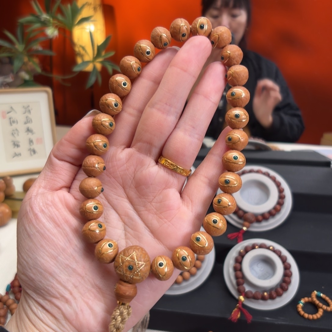凤眼菩提吊坠12毫米手持描眼线