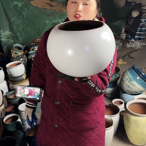口19高22瑕疵盆子。 