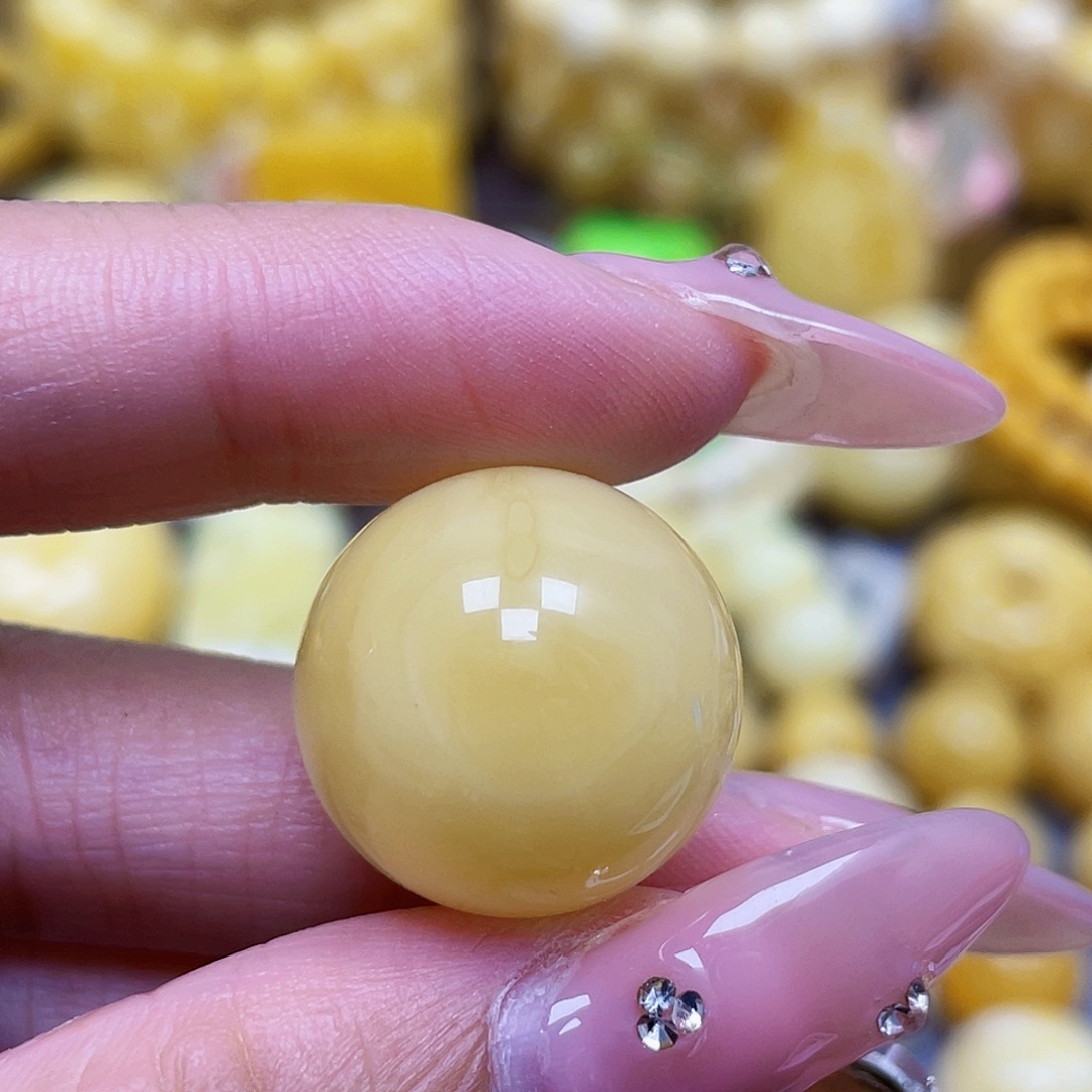 蜜蜡未镶嵌裸石19.3mm瑕