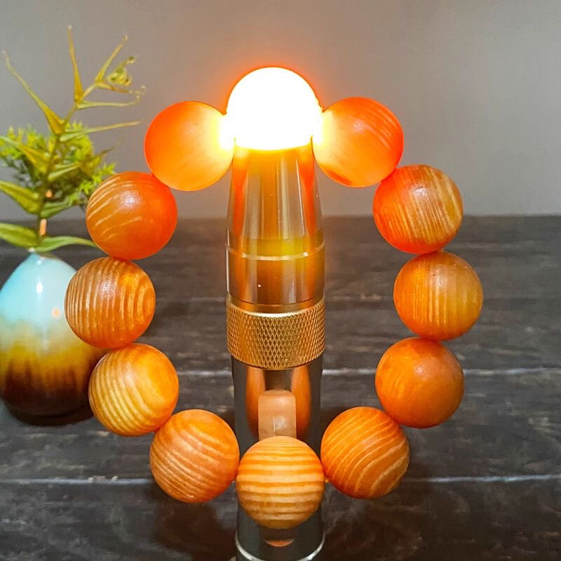 正宗东北天然松树明子全透光满油琥珀木男女沉木饰品手串男款盘玩