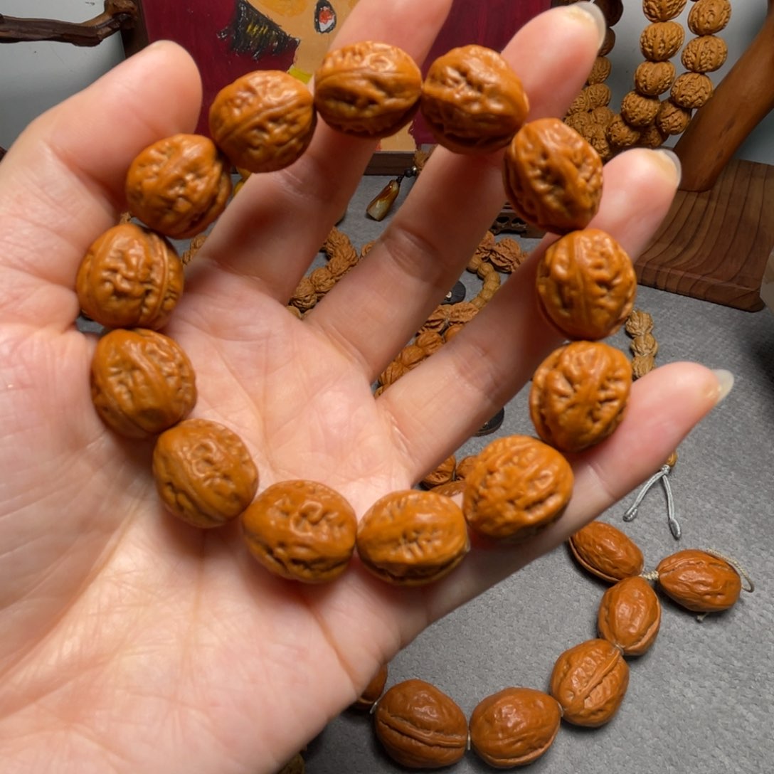 核桃M**J粗筋瓜子手持88