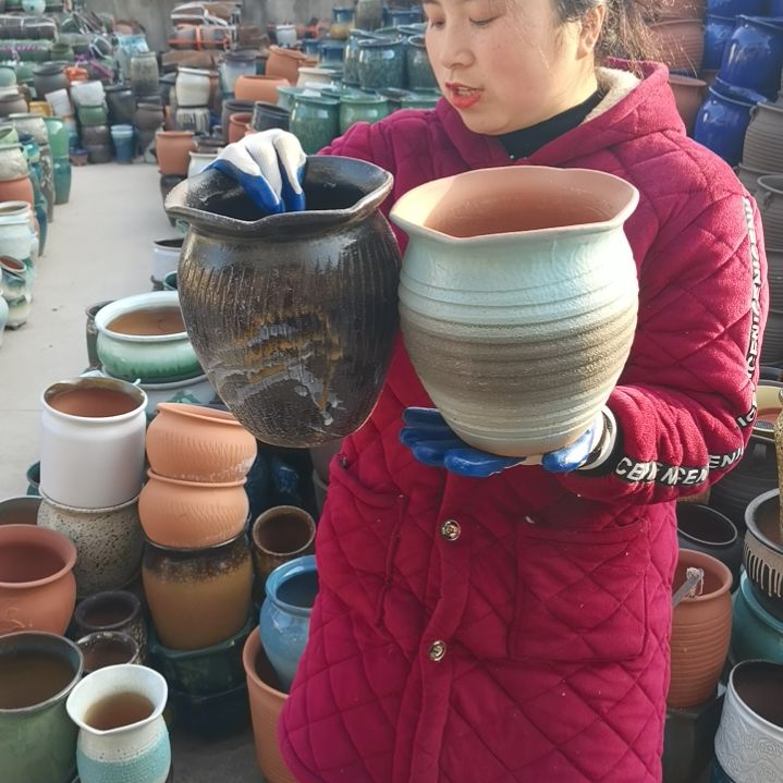 红陶瑕疵两个盆子。。。