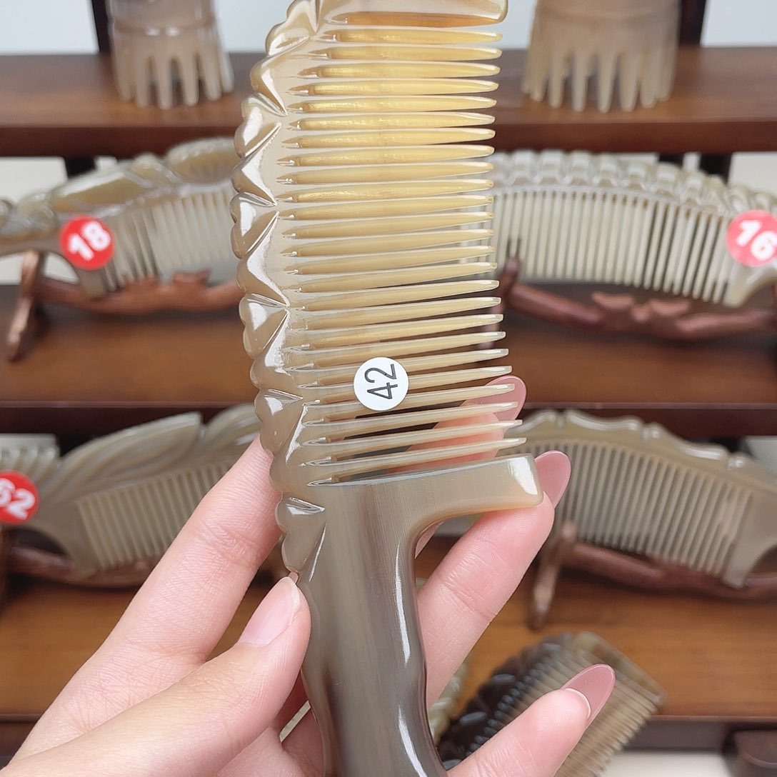 纯手工制作的牛角梳42溪***?