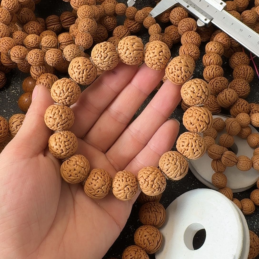 祝***余桃核吊坠野生手串