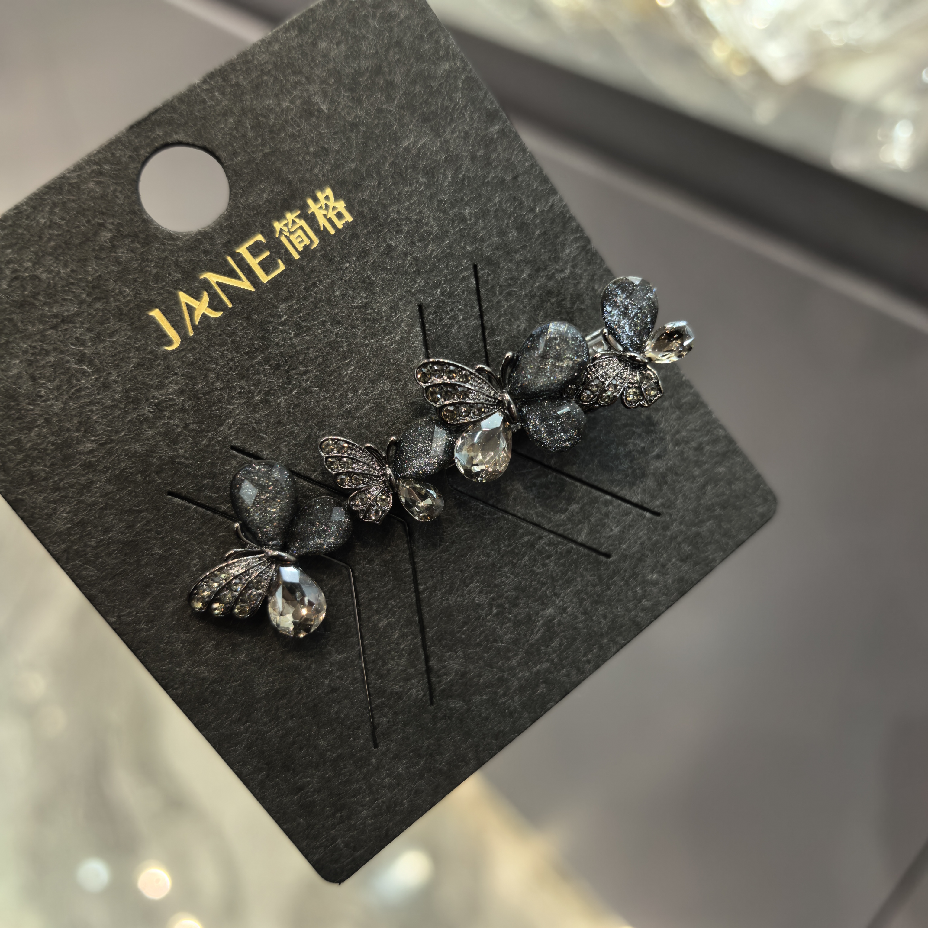 C637黑灰色四只蝴蝶闪闪边夹