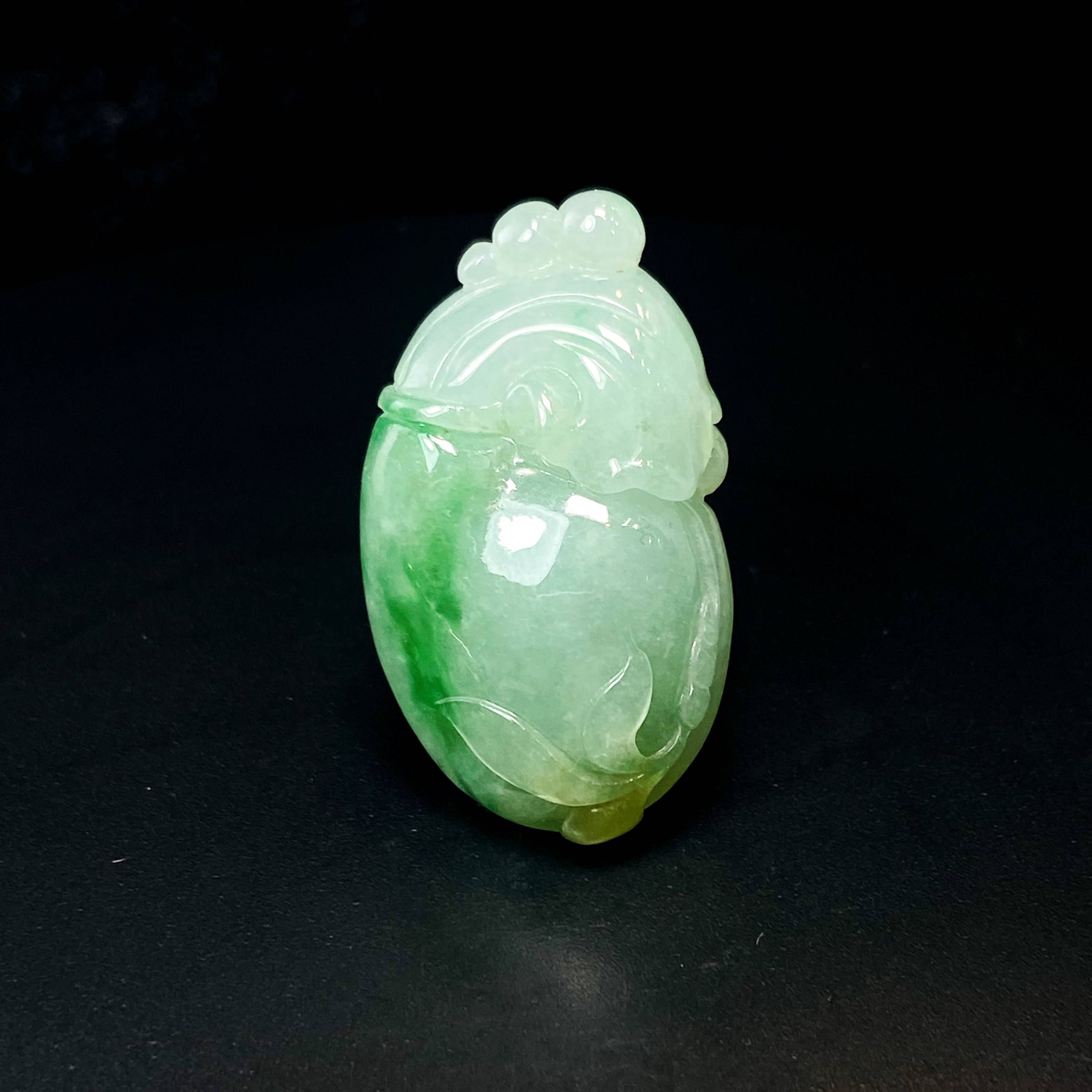 RX20天然缅甸A货翡翠绿胶雕花钱袋/044796/北京中保拍卖