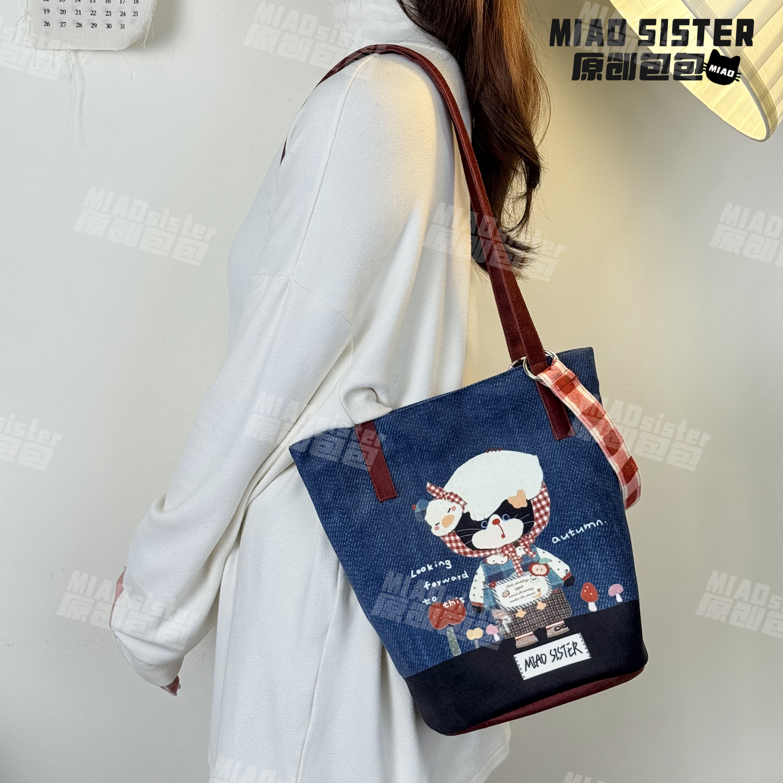 牛仔喵喵新款大容量单肩手提百搭款通勤学生小众可斜挎水桶包B