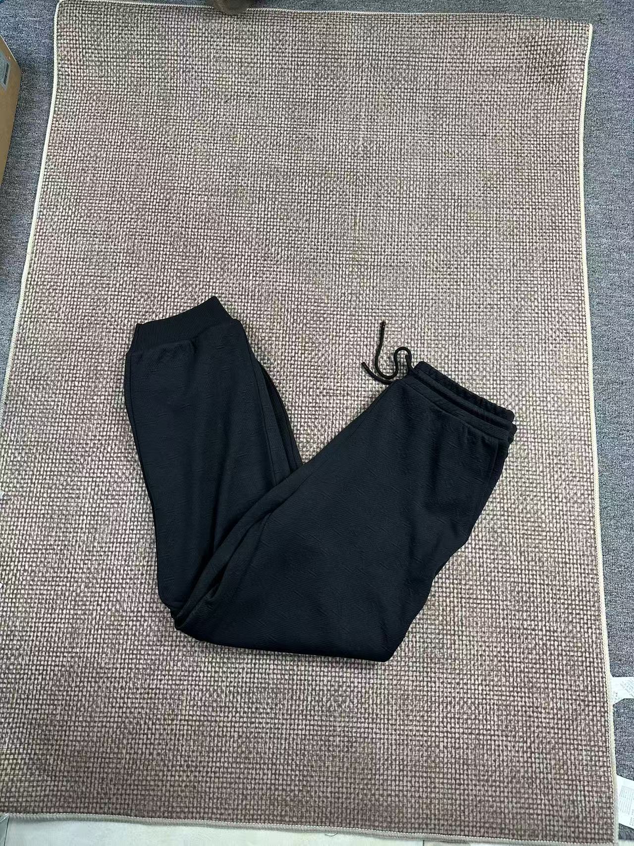 小毛驴休闲暗纹满印老花男士卫裤