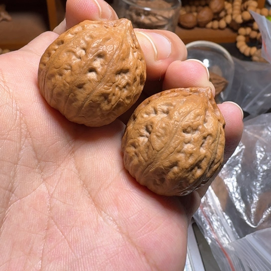 文玩核桃把件金锭子