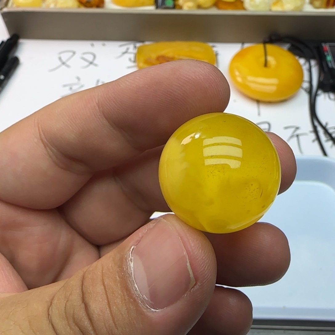 琥珀未镶嵌裸石23.2mm7.24克