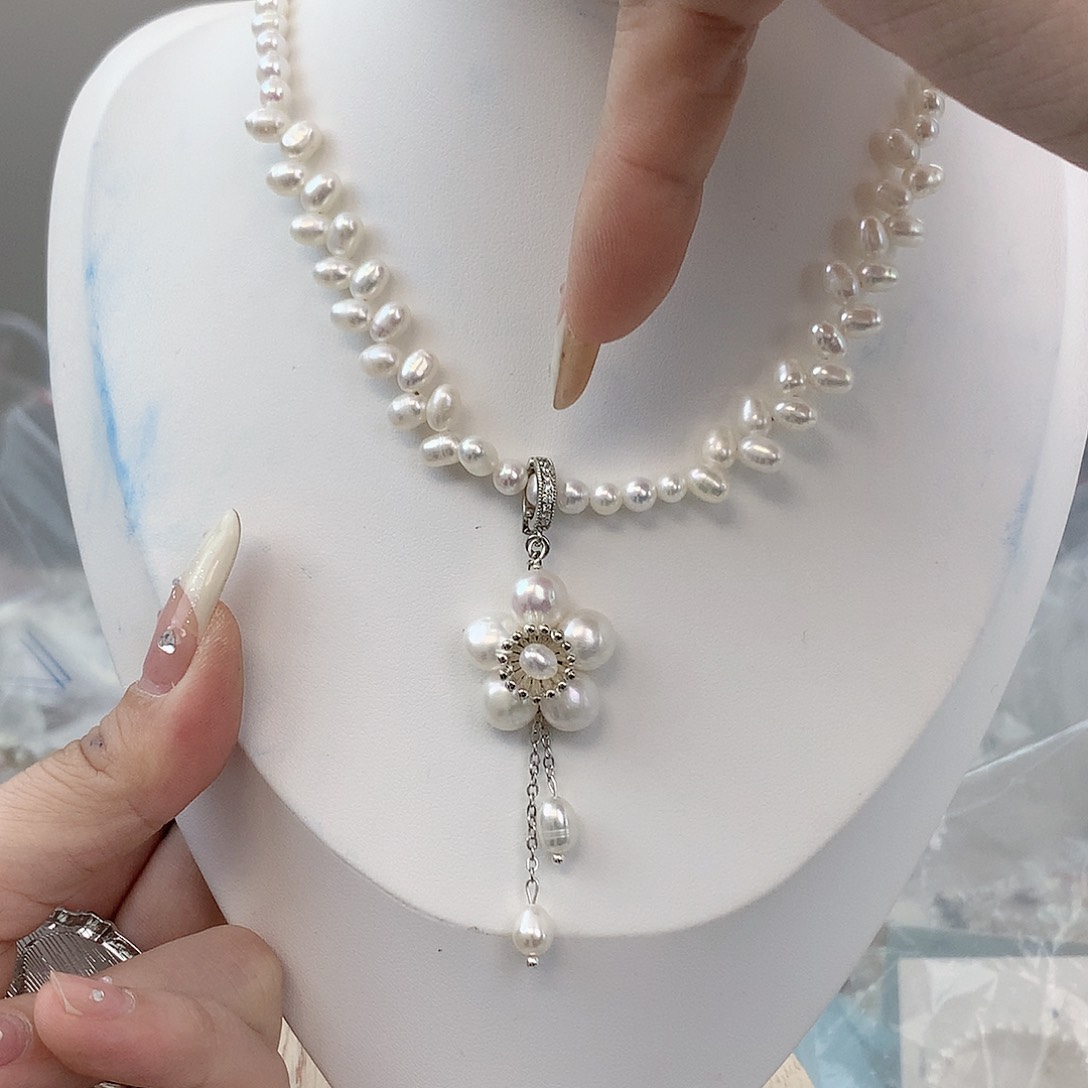 银S925镶嵌耳饰淡水珍珠忽*而