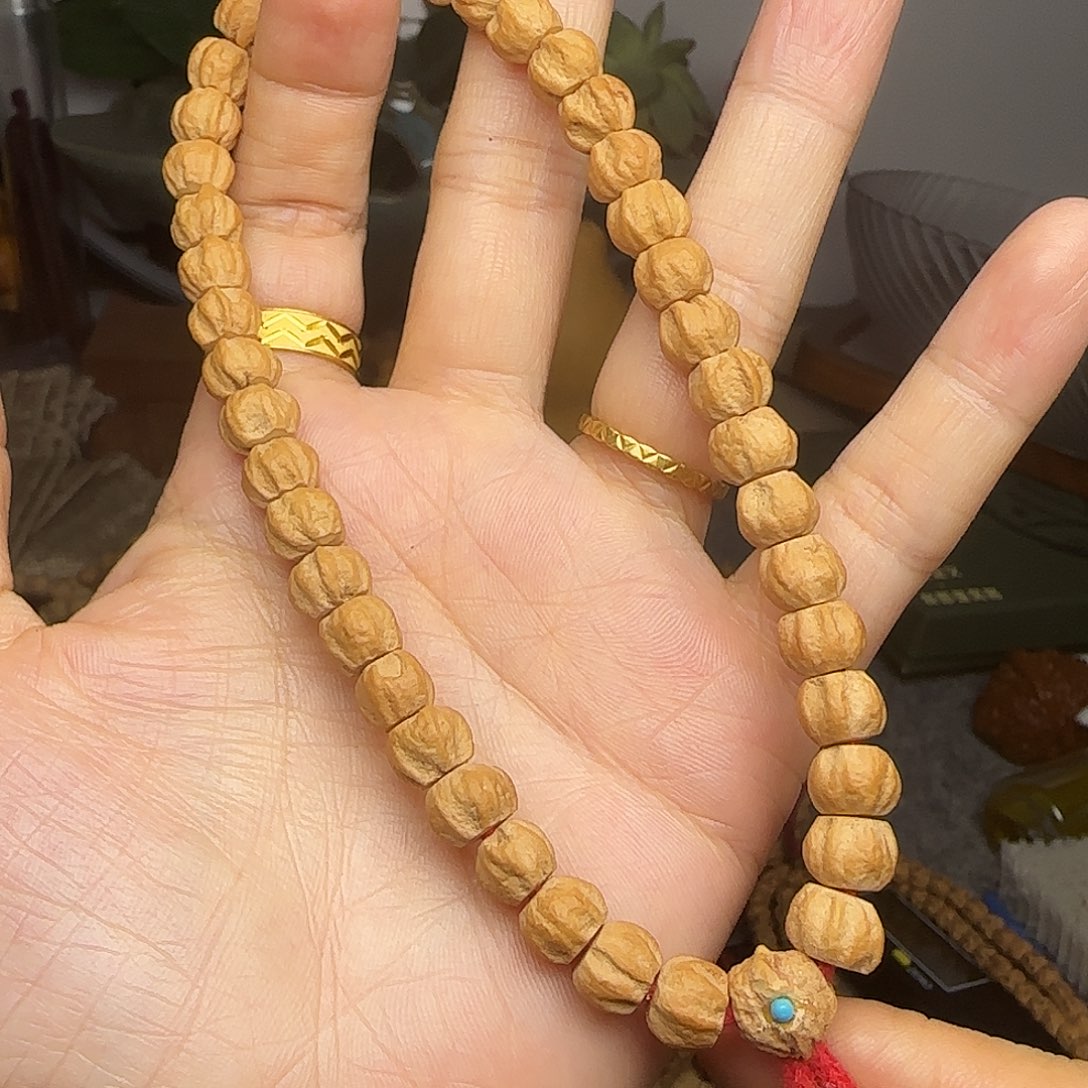 柏香籽/百香籽吊坠手持