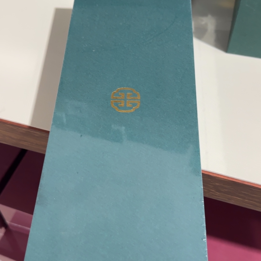 端景台紫檀木类鸡翅木一梳百顺