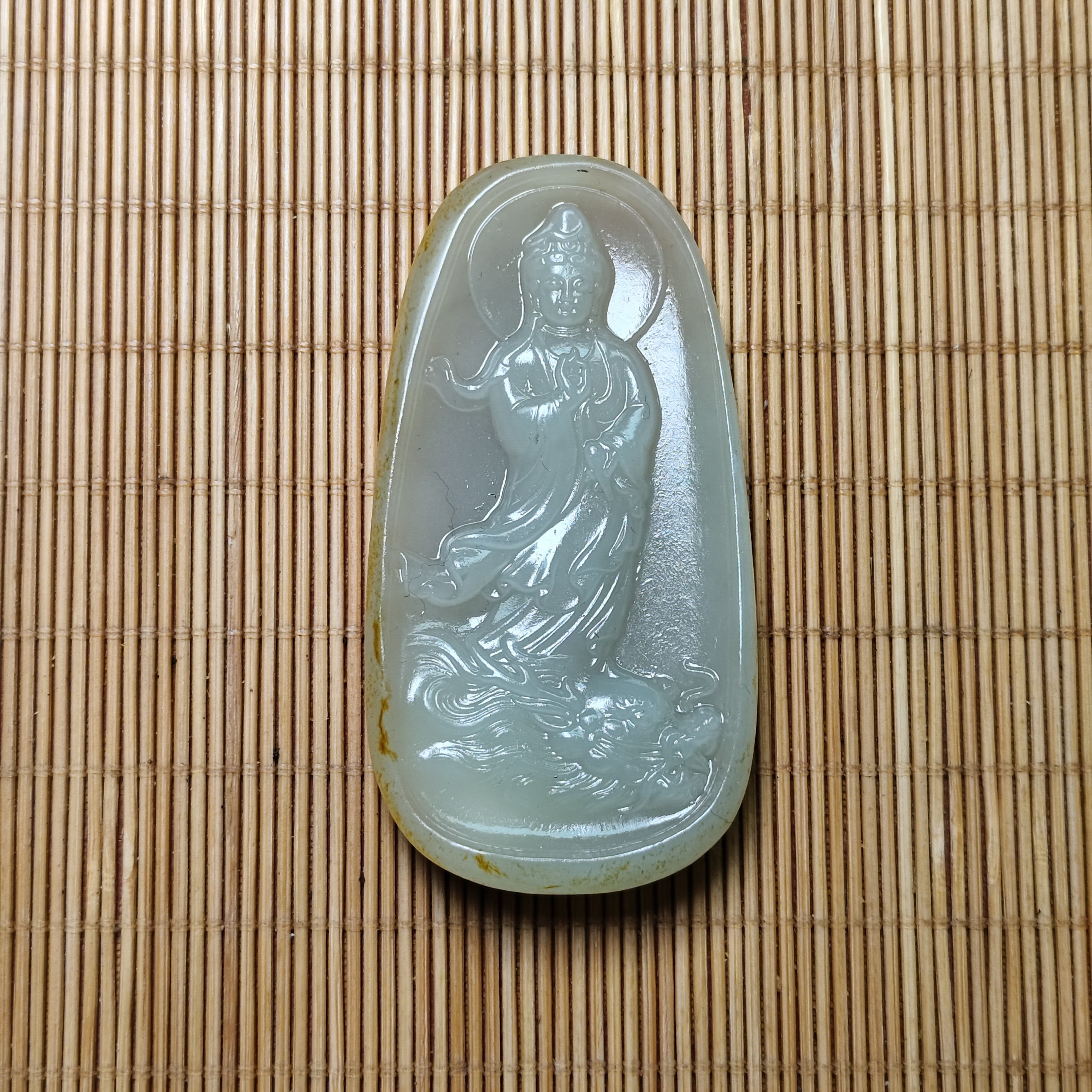 新疆和田玉乘龙观音57克