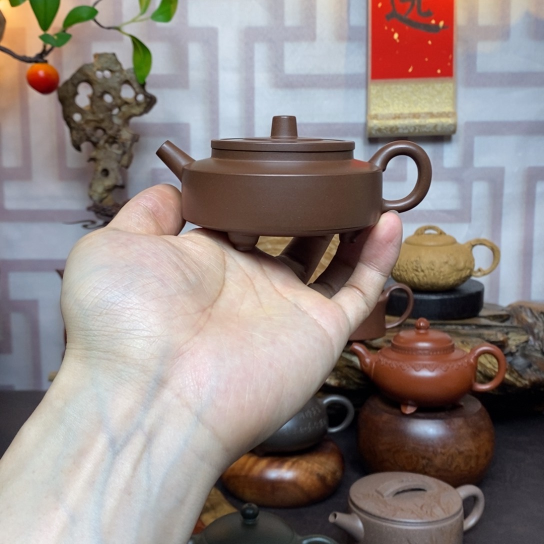 紫砂茶具三足周盘