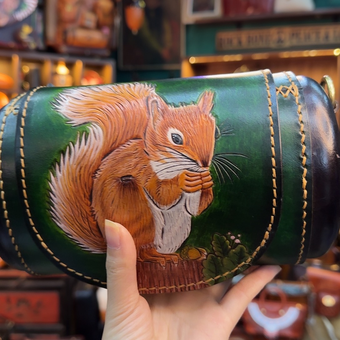 白***女牦牛剖层皮革天池松鼠桶包墨绿色8号