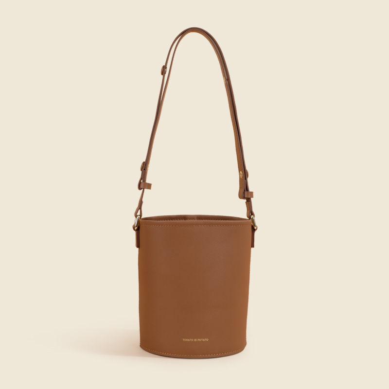 磁扣气质通勤单肩包简约水桶包斜挎包真皮