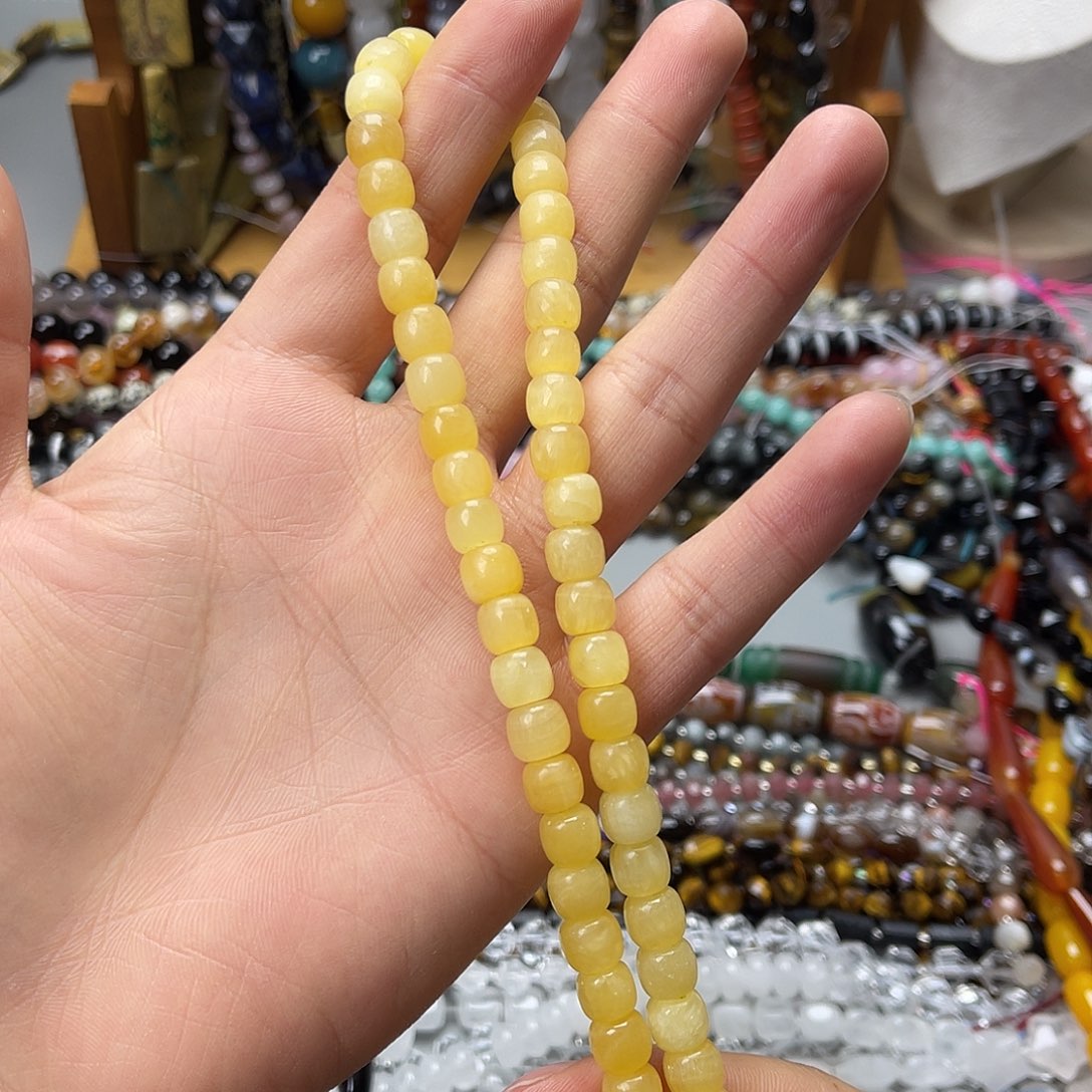 玛瑙/玉髓未镶嵌珠宝半成品卡8米黄玉老型珠一条